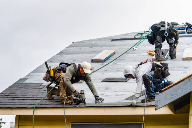 Professional Roofing technician working in Pluckemin, NJ